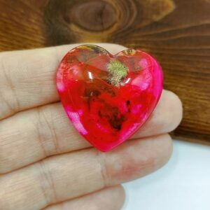 Cabochon hand made cuore in resina, colore rosa, fucsia, oro.