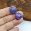 Due cabochon hand made cuore in resina, colore blu, viola, perlato.